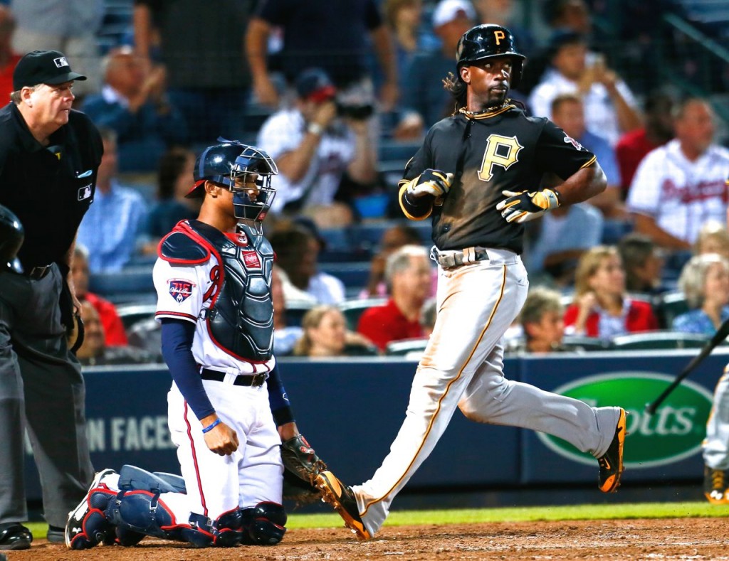 Andrew McCutchen trots home on Starling Marte's two-run double in the seventh Thursday. -- GETTY IMAGES