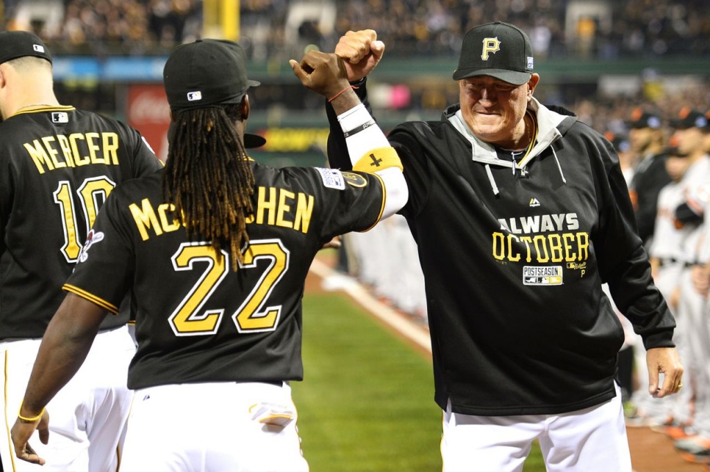Andrew McCutchen and Clint Hurdle do a forearm-bash during pregame intros Wednesday at PNC Park. -- GETTY IMAGES